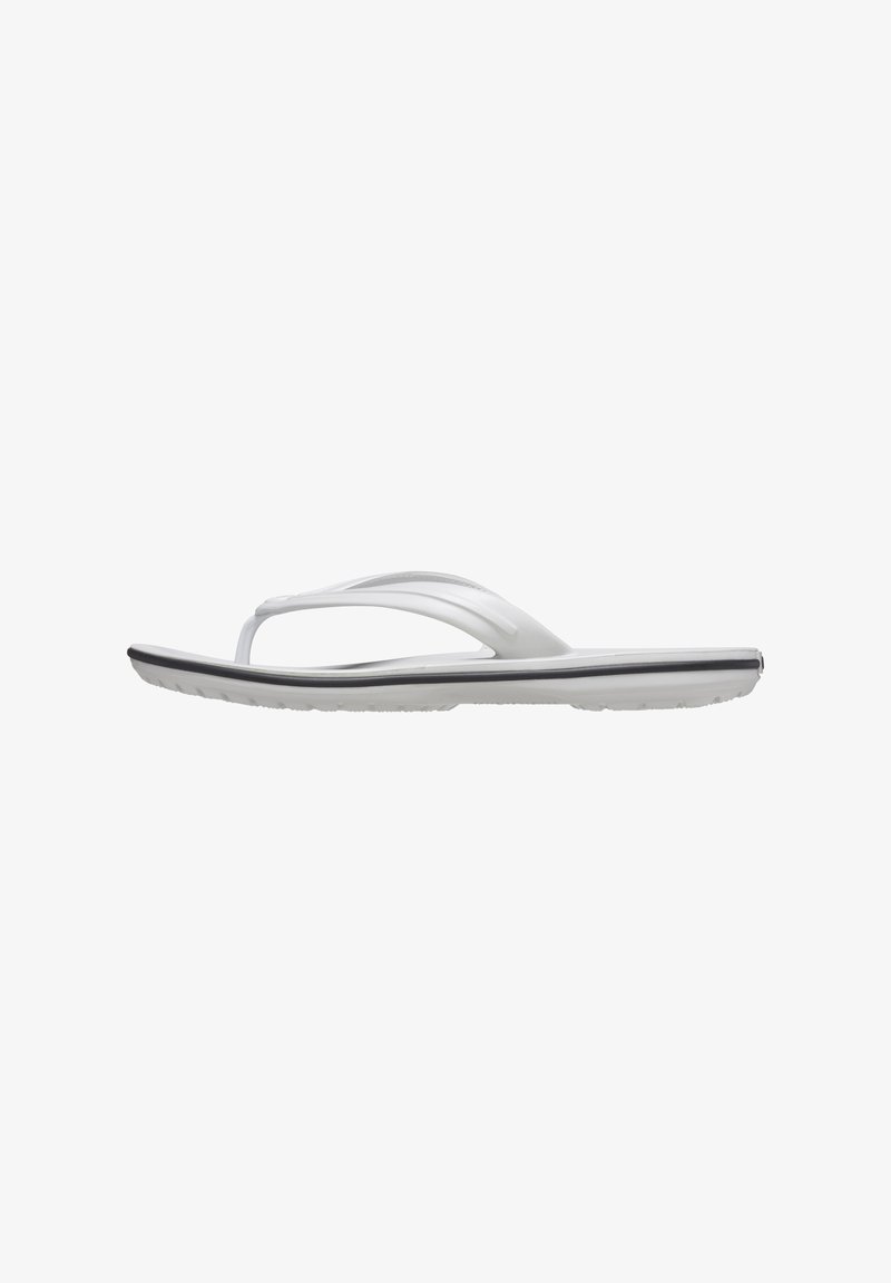 White flip-flop made of rubber with a flat sole, thin straps, and a textured footbed. Features a subtle gray accent on the sole's edge.