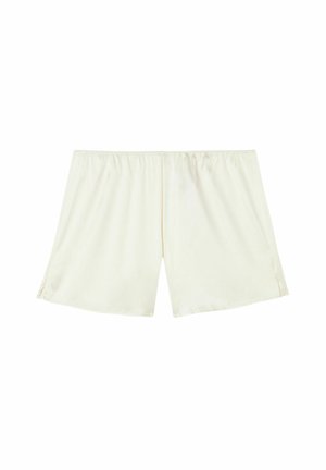 Helle cremefarbene Shorts mit elastischem Bund, aus weichem Stoff gefertigt, mit geradem Schnitt und seitlichen Schlitzen für mehr Bewegungsfreiheit.