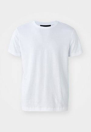 T-shirt en coton blanc avec manches courtes, col rond et texture lisse. Design simple, sans motifs ni matériel visible.