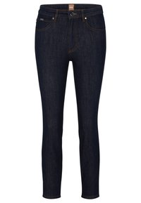 Mörkblå smala jeans i denim med orange sömmar, framknäppning och fem fickor. Klassisk design och passform.