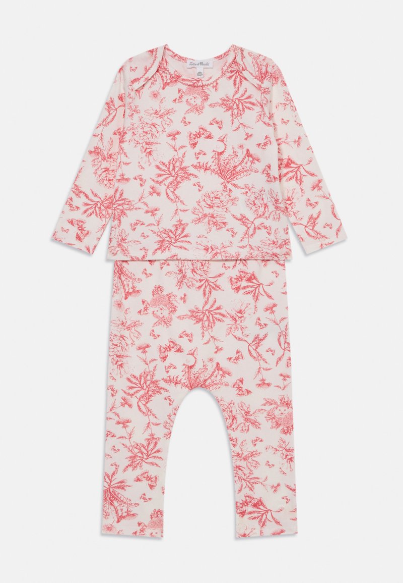 Completo composto da top a maniche lunghe e pantaloni, realizzato in tessuto morbido, con un motivo floreale rosa su uno sfondo crema. Fascia elastica in vita per i pantaloni.