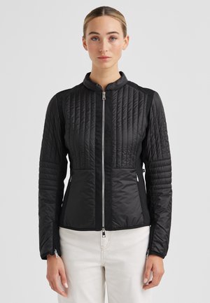 Schwarze gesteppte Jacke mit Reißverschluss vorne, Stehkragen und kontrastierenden Stoffeinsätzen an den Ärmeln. Verfügt über Reißverschlusstaschen und ein tailliertes Design.