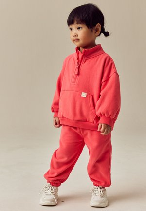 Next Sportinis megztinis - coral pink