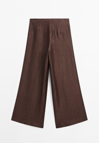 Wide-leg trousers in a rich brown fabric with a textured finish. Features a smooth waistband and a flowy cut offering a relaxed fit.