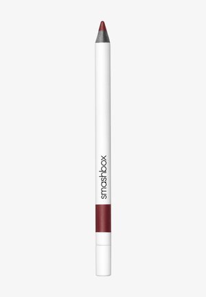 Crayon à lèvres Smashbox avec un corps blanc et une pointe rouge et argent, doté d'une finition mate et d'un point d'application précis.