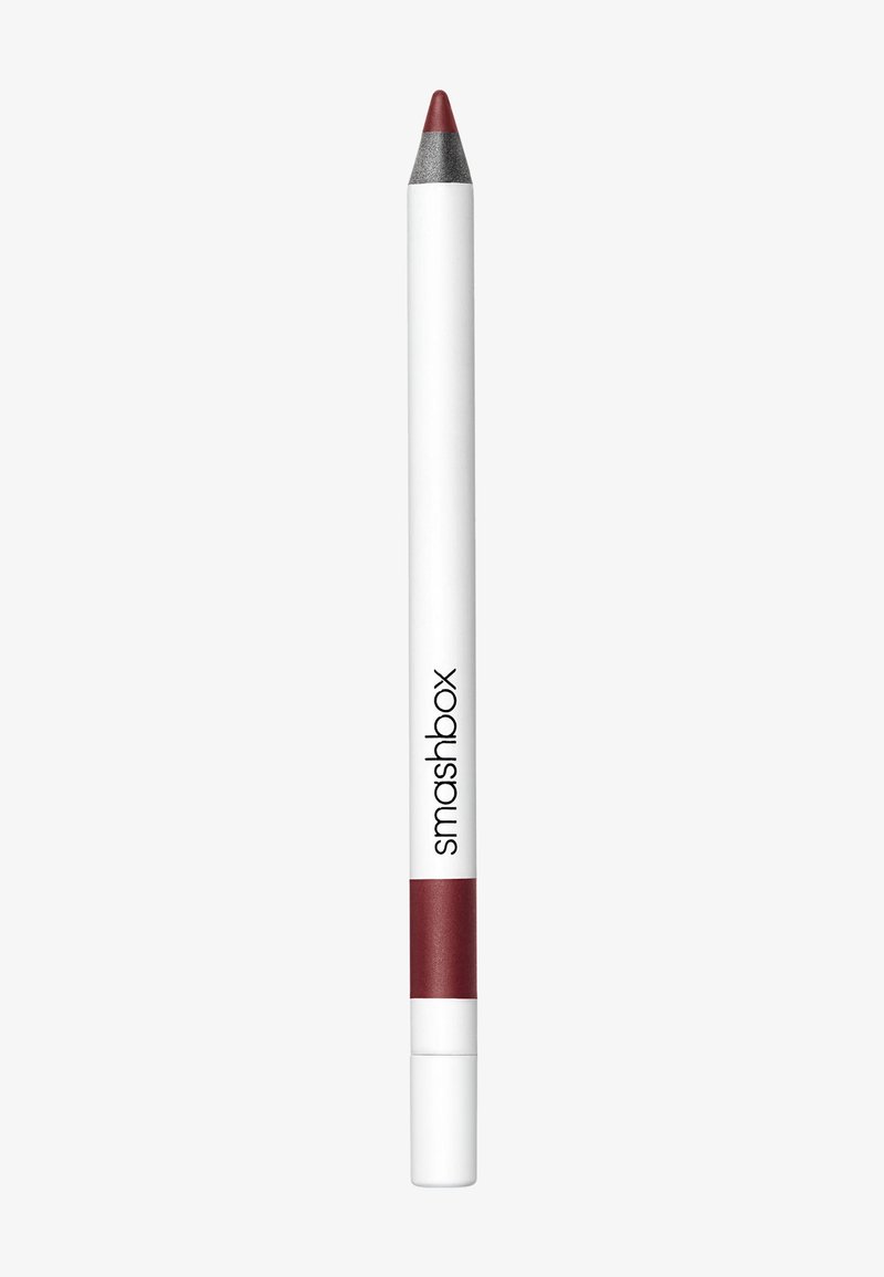 Crayon à lèvres Smashbox avec un corps blanc et une pointe rouge et argent, doté d'une finition mate et d'un point d'application précis.