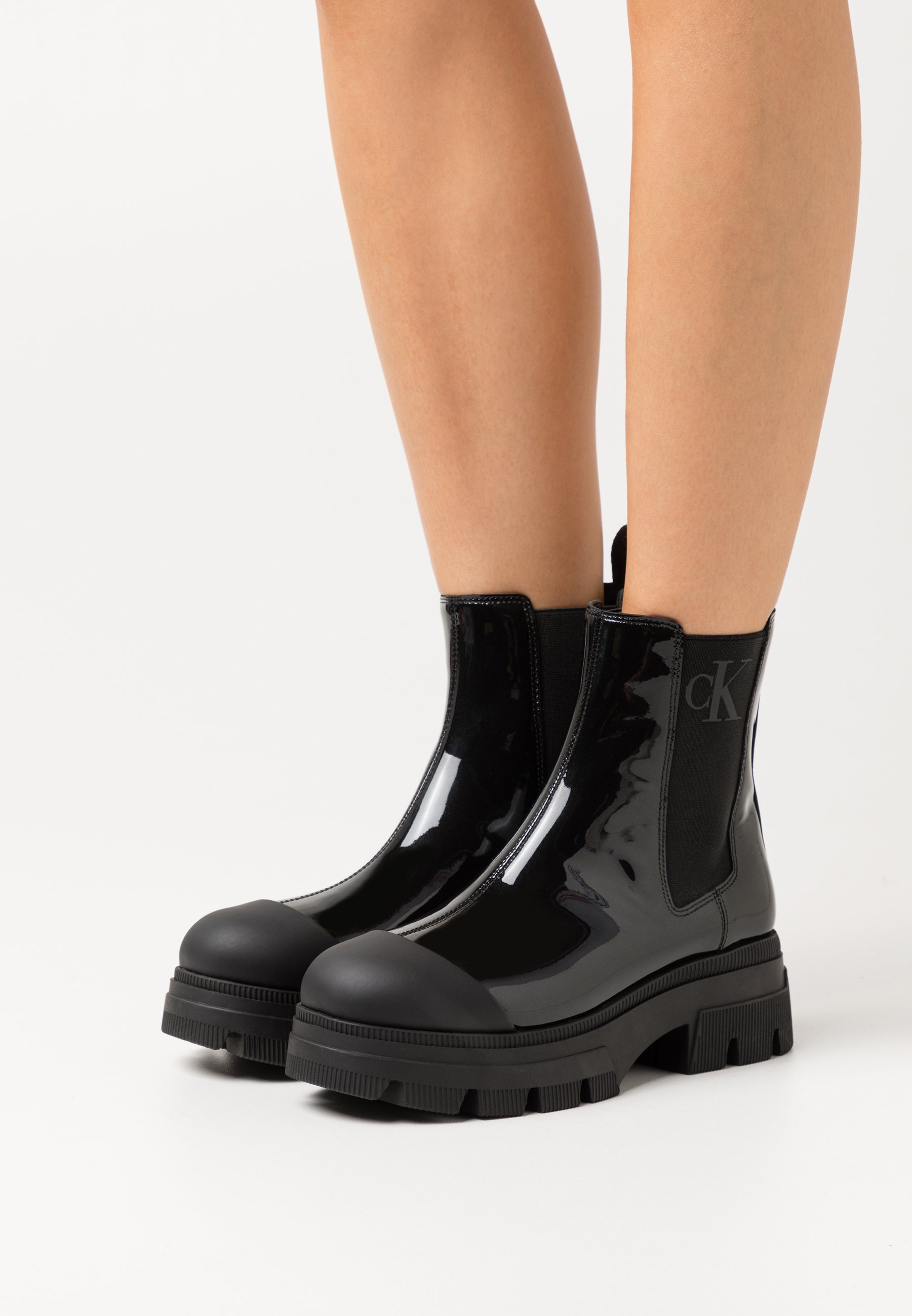 Calvin Klein Jeans CHUNKY COMBAT CHELSEA BOOT - Platform ankle boots - black Calvin Klein Jeans CHUNKY COMBAT CHELSEA BOOT - Platform ankle boots - black