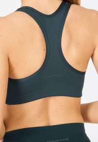 Endurance Urheiluliivit: keskitason tuki - groen