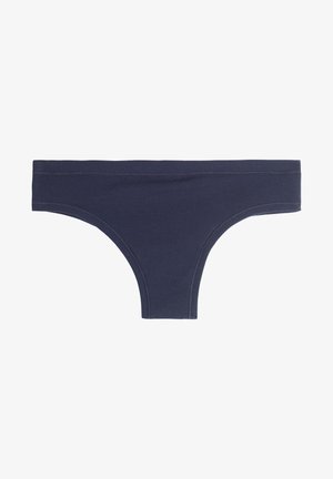 Námořnická modrá bavlněná tanga s širokým pasem a hladkým povrchem. Nemá žádné vzory ani ozdoby, navržena pro minimální krytí.