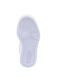 White athletic shoe sole with a herringbone pattern, circular grip detail, and "adidas" logo near the heel. Smooth rubber material.