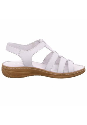 Weiße Ledersandalen mit mehreren horizontalen Riemen und offenem Zeh. Sie verfügen über eine braune strukturierte Sohle für Halt und Unterstützung.