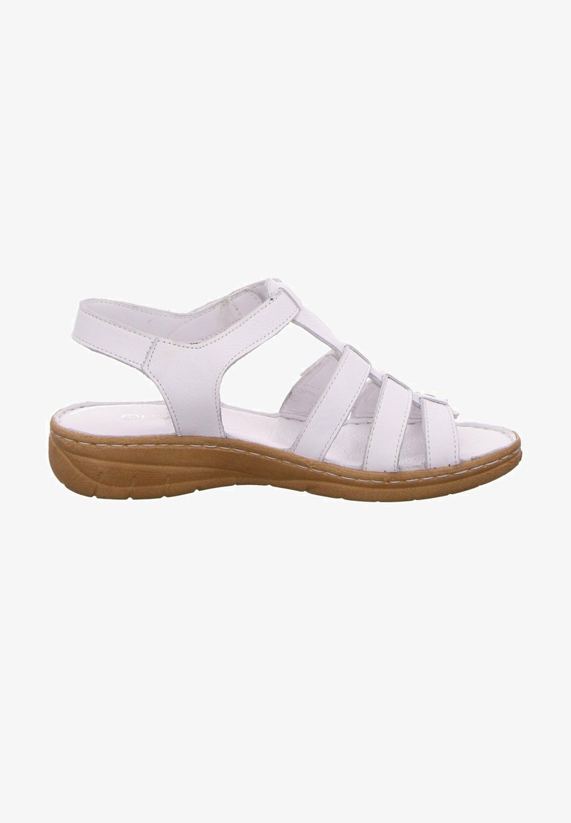 White leather sandals with multiple horizontal straps and an open toe. Features a brown textured sole for traction and support.