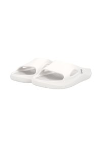 White slide sandals made of smooth material with an open toe design, featuring side cutouts and a textured insole for comfort.
