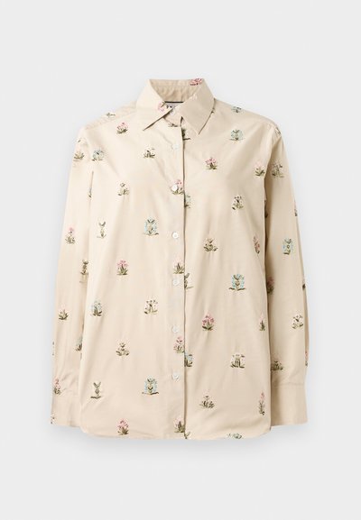 Cămașă crem cu nasturi, cu broderie florală în nuanțe de roz și albastru. Material moale și neted, cu guler clasic și mâneci lungi.