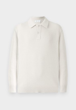 Light beige knitted polo sweater with ribbed texture, a collar, and two buttons. Features long sleeves and a fitted hem.