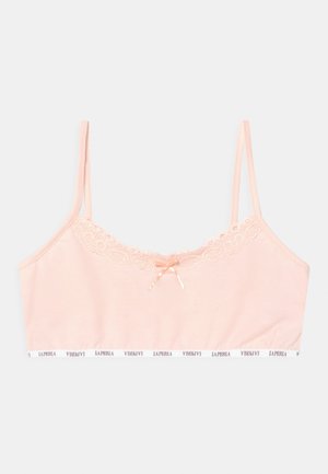 Bralette rosa com acabamento em renda na gola, tecido leve, alças ajustáveis e um pequeno laço na parte da frente. Logótipo "LA PERLA" na banda.