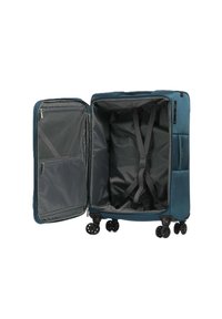 Valigia rigida di un profondo teal, con un ampio interno, cinturini per fissare il contenuto e numerose tasche in rete. Quattro ruote girevoli.