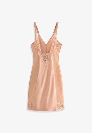 Meztelen selyem slip ruha csipkés díszítéssel a nyakvonalnál és az alsó szegélyen. Állítható pántokkal és sima textúrával rendelkezik. V-alakú hátrész kialakítás.