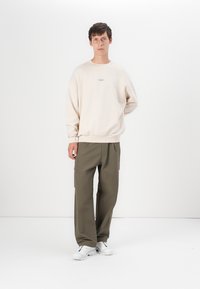 Oakley STACKED METAL CREWNECK  - Sudadera - beige