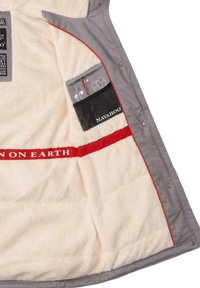 Gray coat with a soft, cream-colored fleece lining. Features red accents and a mesh pocket labeled "Navahoo." Includes a branded inner label.