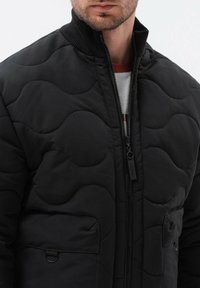 Ombre Vinterjakker - black