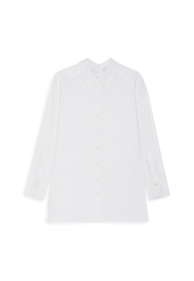 White long-sleeve shirt made of cotton, featuring a classic collar, button-down front, and buttoned cuffs, with a slightly loose fit.