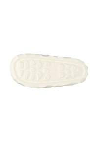 White rubber shoe sole with a textured, patterned grip featuring hexagonal shapes and raised sections for traction.