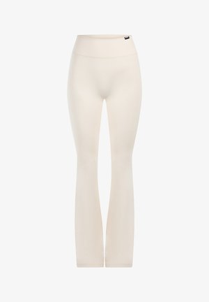 Leggings in een neutrale beige kleur, met een hoge tailleband, een aansluitend ontwerp en een zachte, rekbare stof zonder zichtbare patronen.