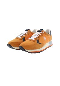 Orange suede sneakers with white laces, a black accent at the heel, contrasting orange panel, and a textured black outsole with logo detail.