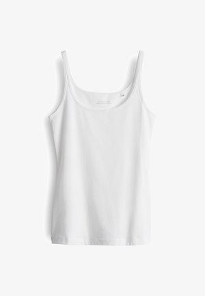 Débardeur blanc à fines bretelles, fabriqué en tissu de coton doux. Il présente un col rond et un ourlet droit sans embellissements.