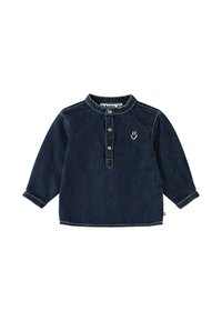 Tumman denim-kankaan pitkähihaisen paidan, jossa on pyöreä kaulus, nappilista ja pieni käden graafinen kuvitus rinnassa. Ominaisuuksina rento istuvuus.