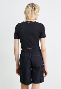 Jordan Lihtne T-särk - black/white
