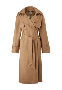 Beige trench coat med dubbelknäppt design, bred krage, midjeband och sidofickor. Tillverkad av ett slätt tyg med en något strukturerad yta.