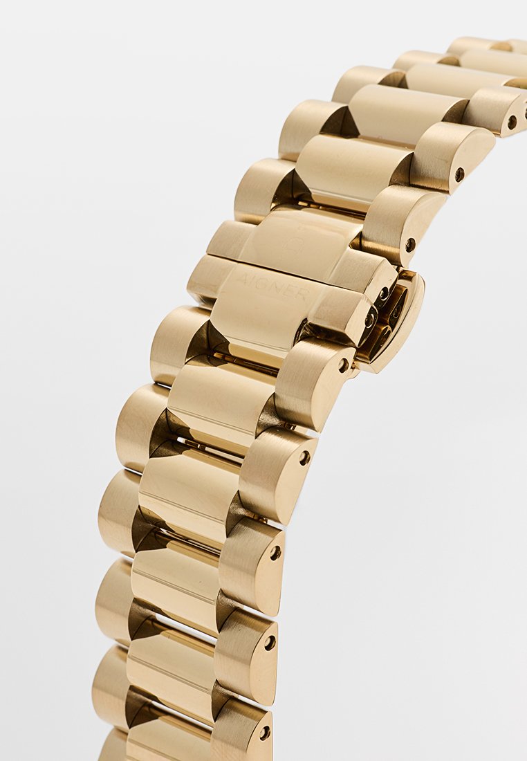 Goldfarbener Metallarmband für Uhren mit einem Glieddesign, das abgerundete, polierte Segmente und einen sicheren Verschlussmechanismus aufweist.