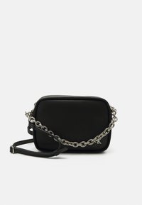 Black rectangular bag made of smooth material, featuring a chunky silver chain strap and a detachable leather shoulder strap.
