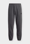 ESSENTIALS 3 STRIPES TAPERED CUFFED PANTS - Долнище на анцуг - grey five/black