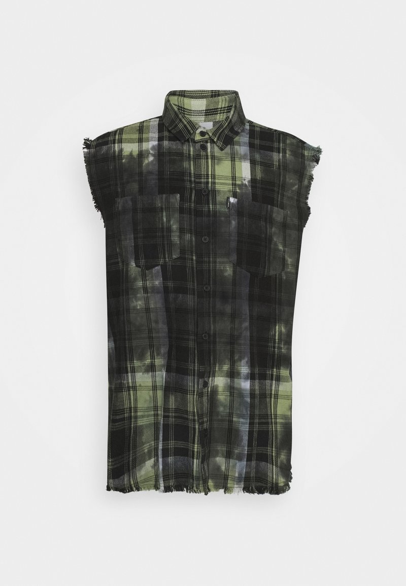 Kortærmet ternet skjorte i sort og grøn, lavet af bomuld, med to forlommer og frynser langs kanten.