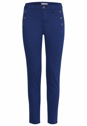 Sötétkék skinny nadrág rugalmas anyagból, gombos záródással és három díszgombbal a derékrész mindkét oldalán.