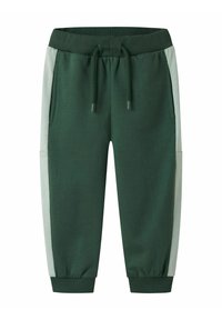 Groene sweatpants met een trekkoord in de taille, voorzien van lichtgrijze zijpanelen, ribbelmanchetten en twee zijzakken. Gemaakt van zachte stof.