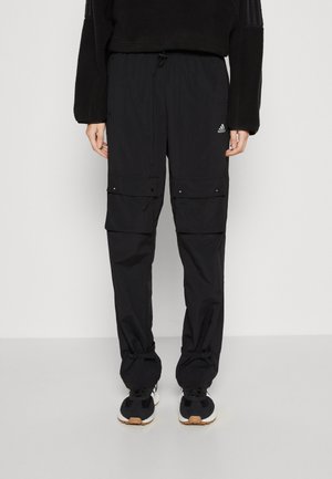 TIRO - Cargo trousers - black