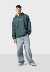 Kaotiko THE ONLY TRUTH IS MUSIC UNISEX - Jersey con capucha - sand