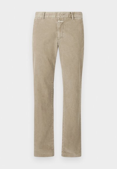 Μπεζ παντελόνια καμπάνα από κορντούρα με λουράκια ζώνης και κρυφά κλείσιμο μπροστά, τοποθετημένα επίπεδα σε λευκό φόντο.