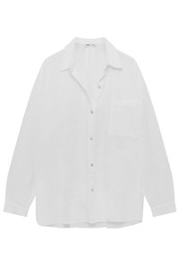 White linen blouse with a collar, long sleeves, a front patch pocket, and buttoned closure. Lightweight and textured fabric.