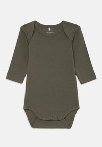 Tamnozeleni bodysuit dugih rukava izrađen od mekanog pamuka, s okruglim izrezom i kopčanjem na dnu. Jednostavan i funkcionalan dizajn.