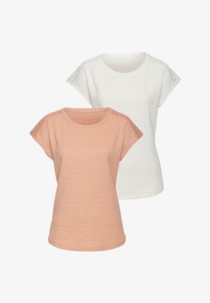 Two short-sleeve T-shirts: one in light peach, one in white. Both feature a textured fabric and a round neckline.