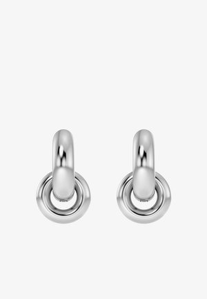 Orecchini in metallo argentato caratterizzati da un design arrotondato con una superficie liscia e riflettente e un accento a forma di anello circolare.