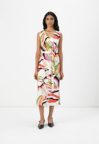 Floral-patterned dress featuring vibrant colors like pink, green, and orange. Made of lightweight fabric with a V-neck and belted waist.
