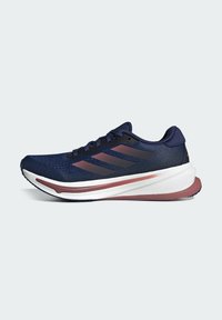 Navy blue athletic shoe with mesh upper, three black stripes, white and maroon sole, padded collar, and textured design elements.
