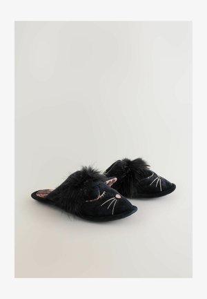 Schwarze, plüschige Hausschuhe mit Katzenface-Design, das gestickte Details und einen faux-fur Pomponschmuck auf dem Obermaterial aufweist. Spitz zulaufende Form.