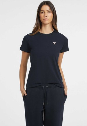 Navy blue short-sleeve t-shirt made from cotton. Features a triangular logo patch on the chest and a round neckline. Smooth texture.